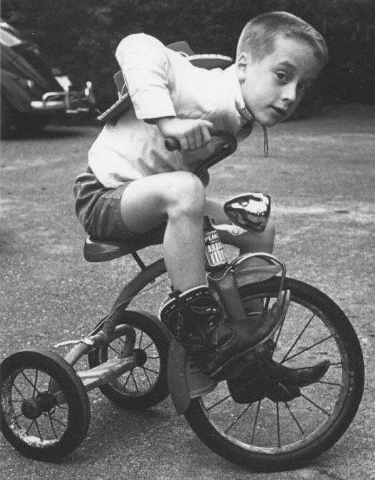 Andrew riding a trike, Seattle, NY